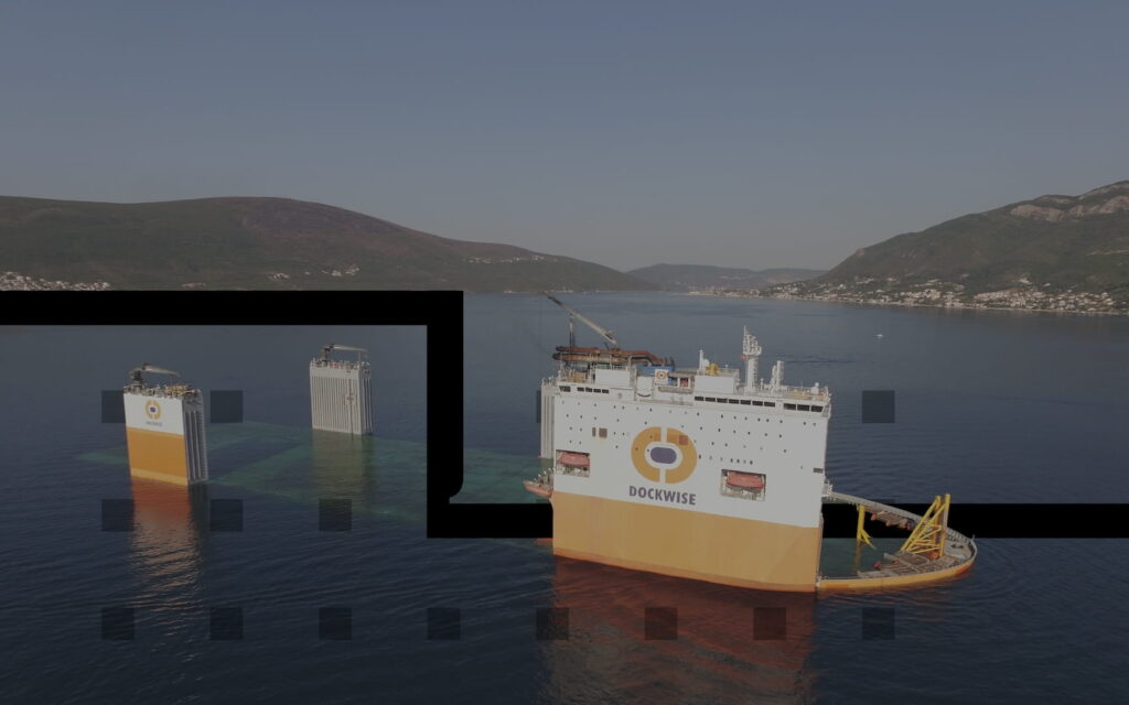 Dockwise vessel approaching port during coastal operations